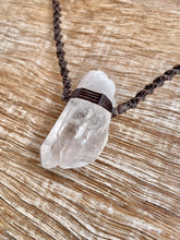 Load image into Gallery viewer, Clear Quartz Necklace on Brown